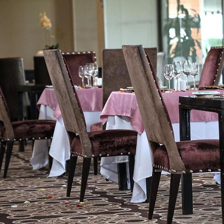 Royal Marang Hotel Phokeng Exterior photo Restaurant
