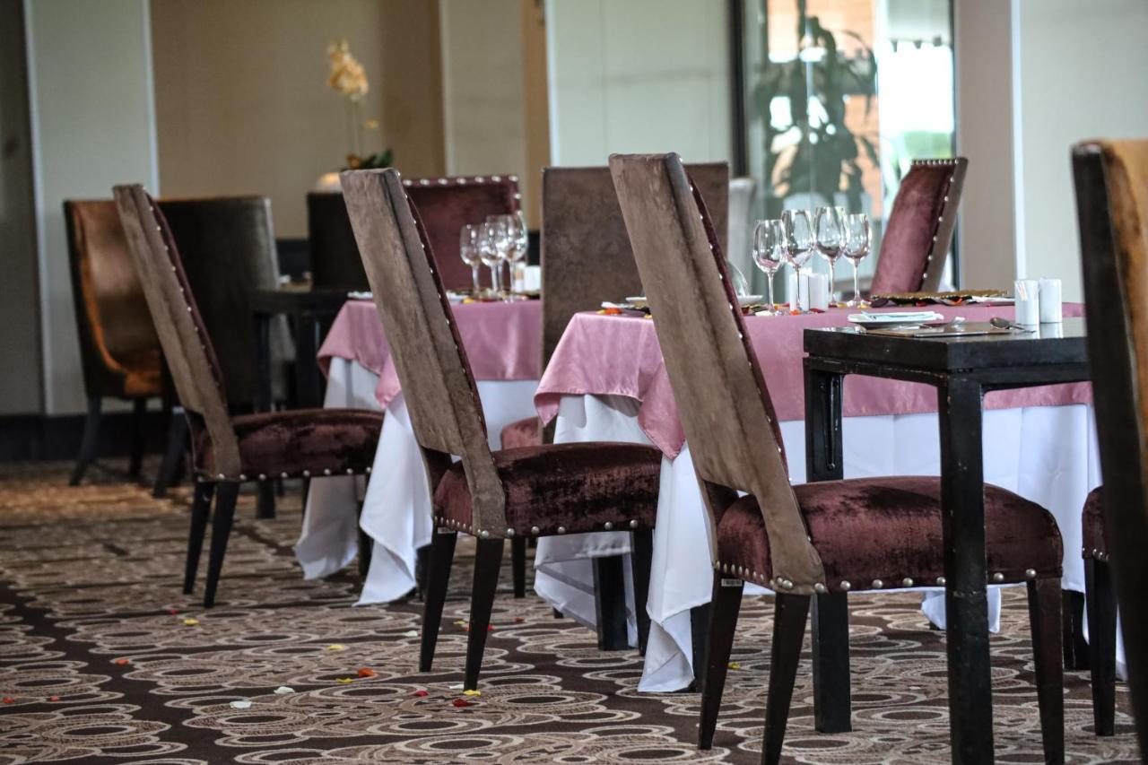 Royal Marang Hotel Phokeng Exterior photo Restaurant